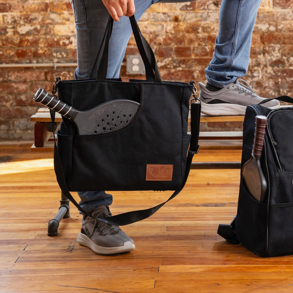 Premium Black Paddle Bag for Pickleball - Man Holding It